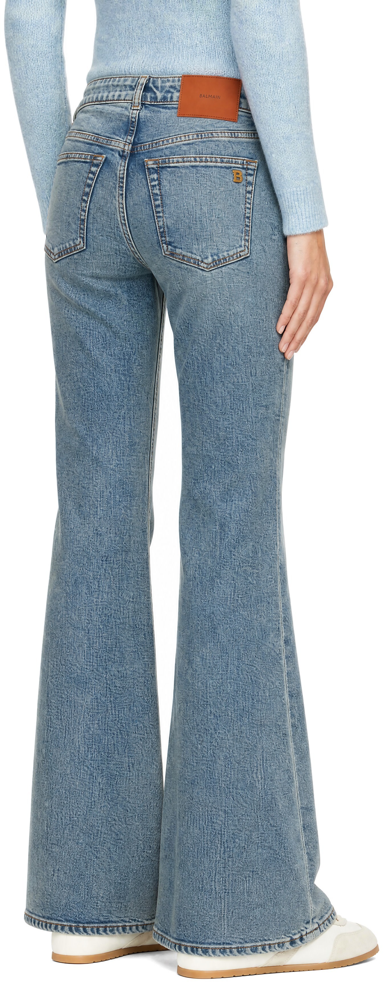 BALMAIN: Blue Bootcut Faded Denim Jeans | SSENSE