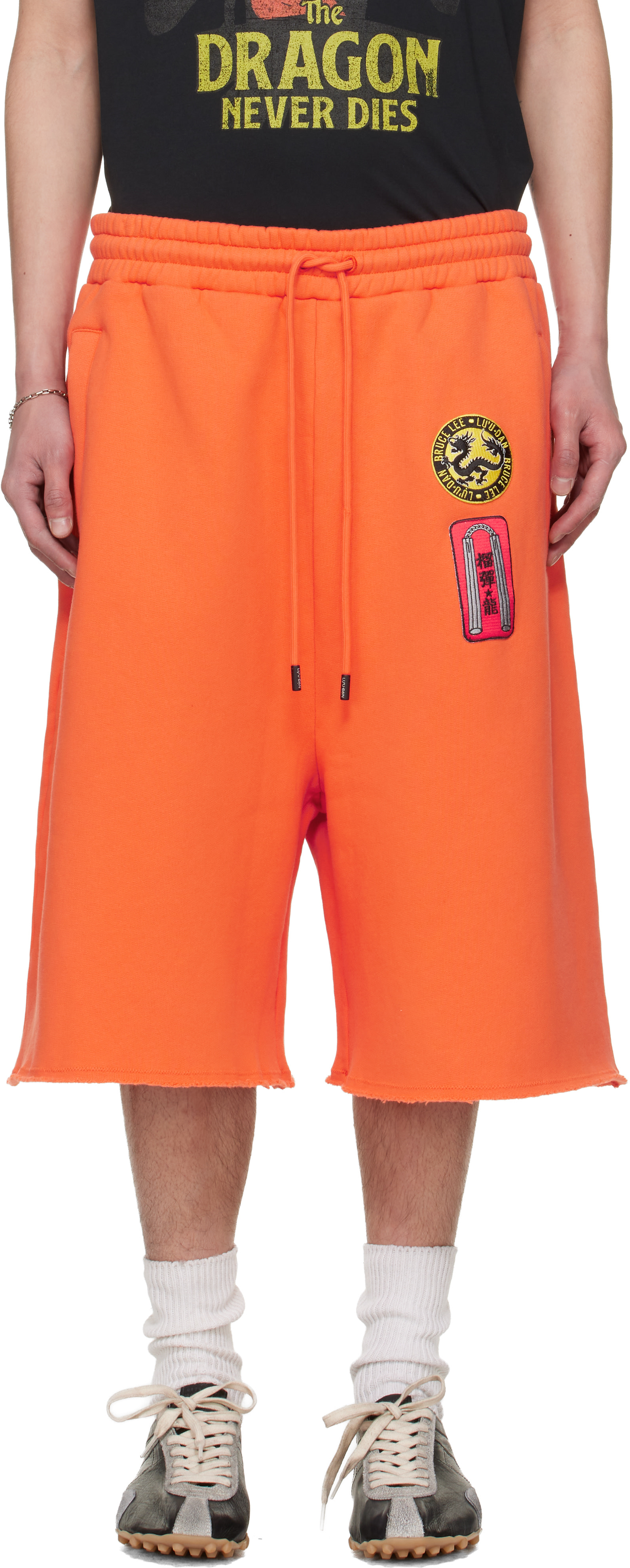 LU'U DAN: BRUCE LEE x LỰU ĐẠN Orange Zoku Shorts | SSENSE