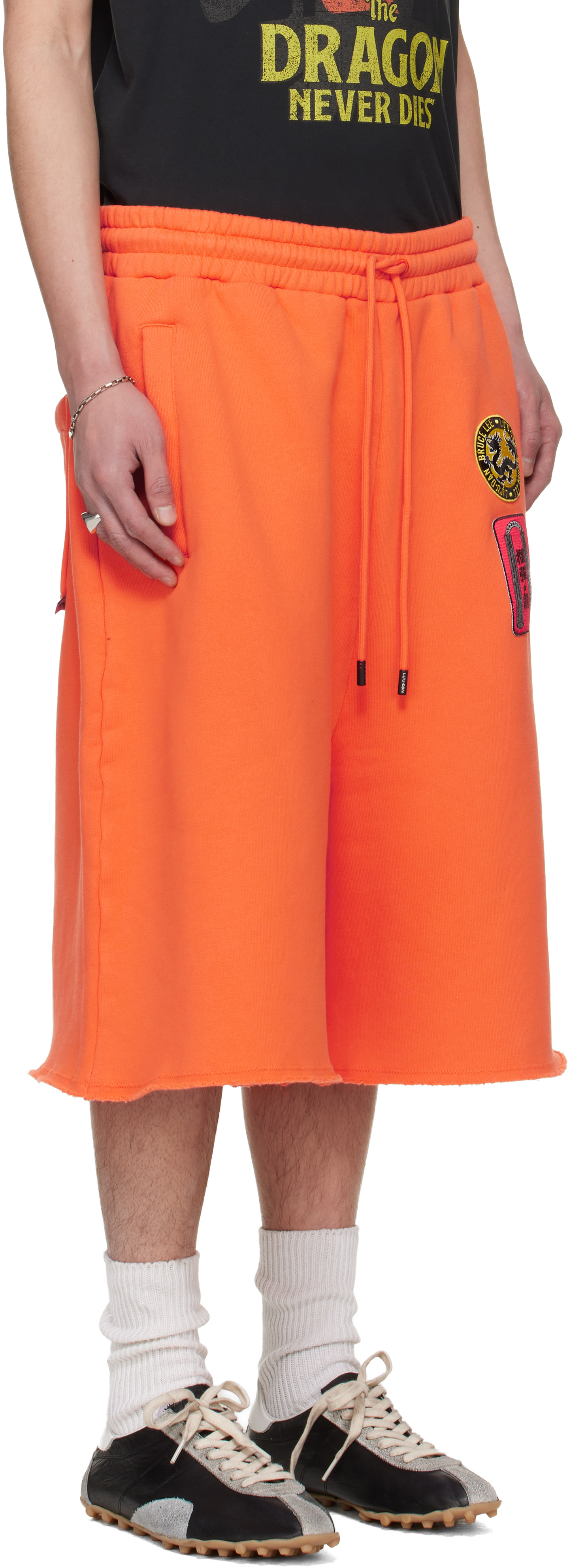 LU'U DAN: BRUCE LEE x LỰU ĐẠN Orange Zoku Shorts | SSENSE
