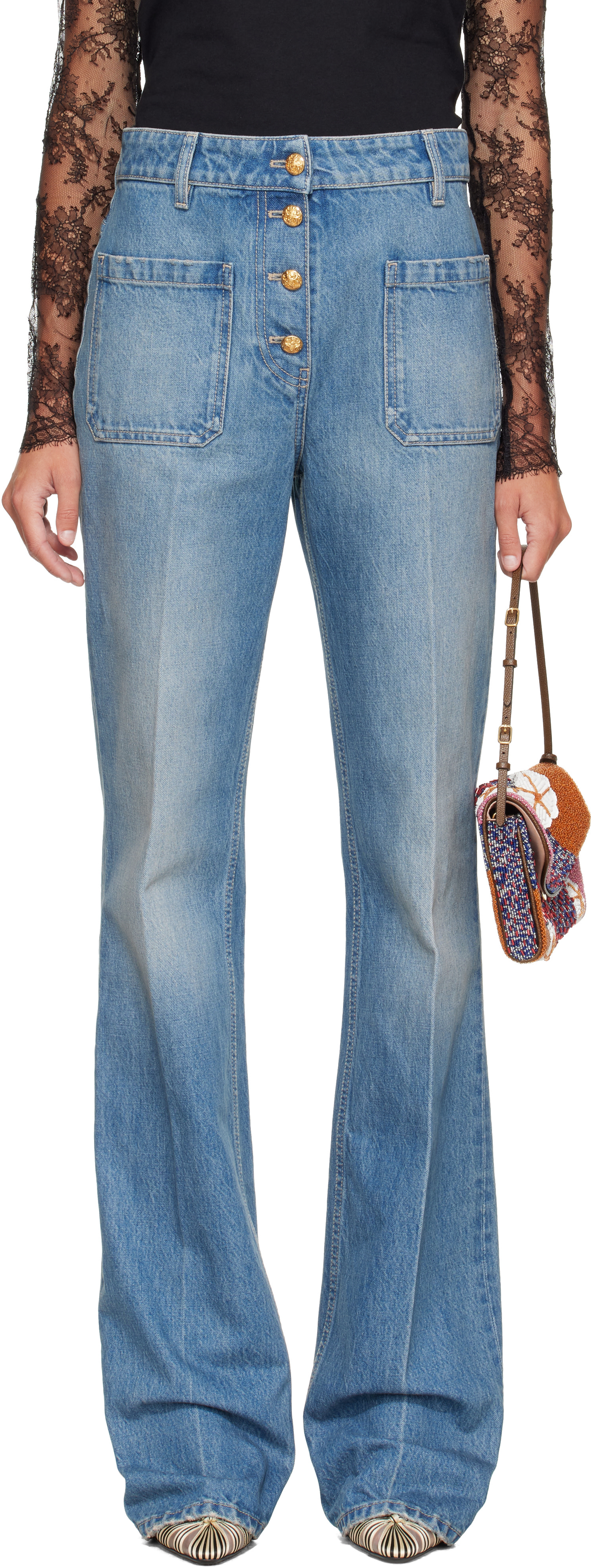 Valentino: Blue Denim Exposed Button Jeans | SSENSE