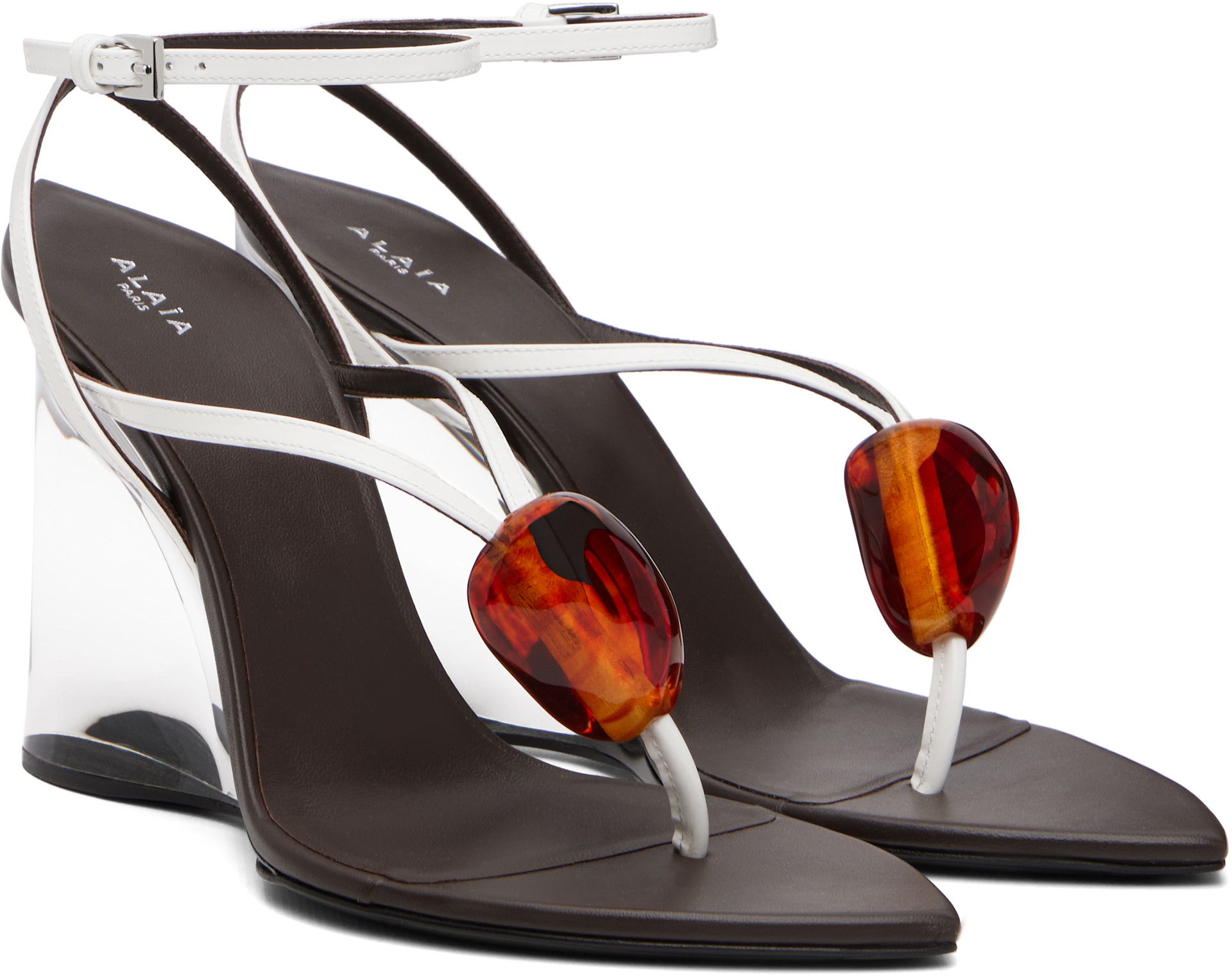 ALAÏA - Sandales blanches à talon compensé transparent