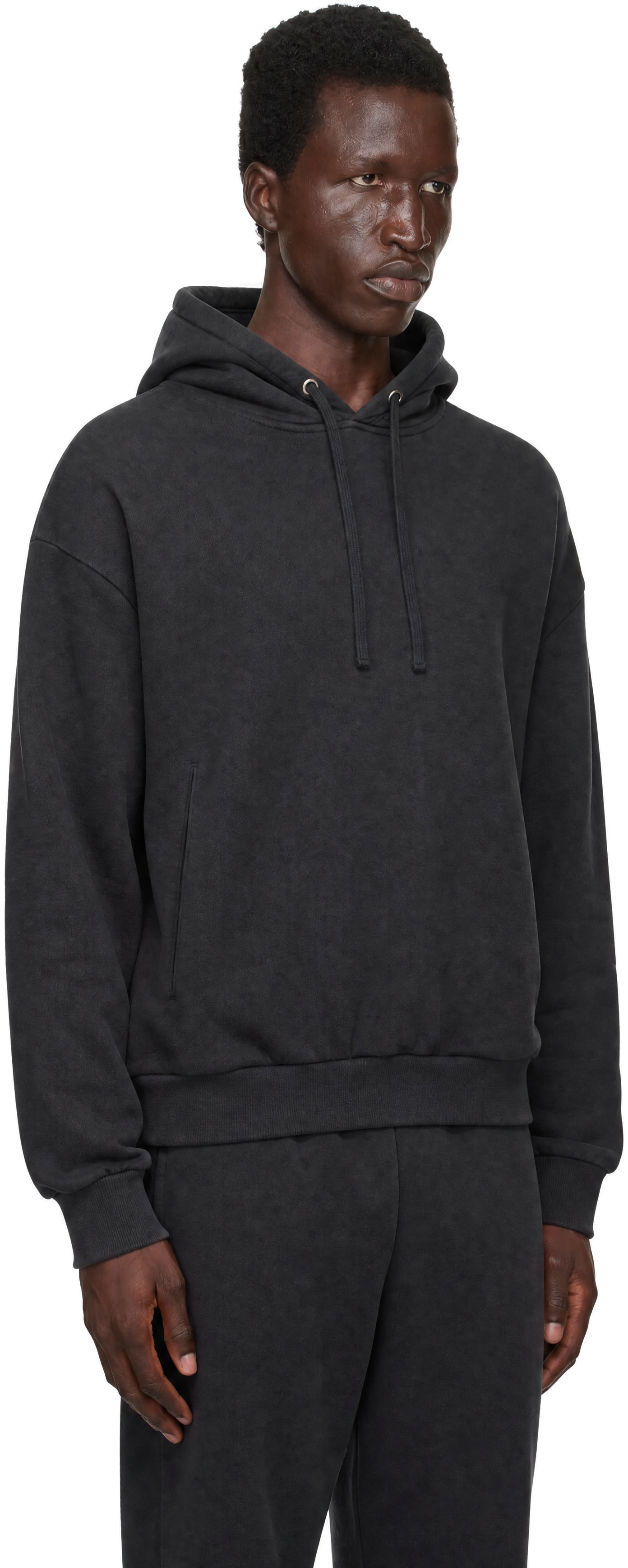 SKIMS - Pull à capuche noir en molleton épais