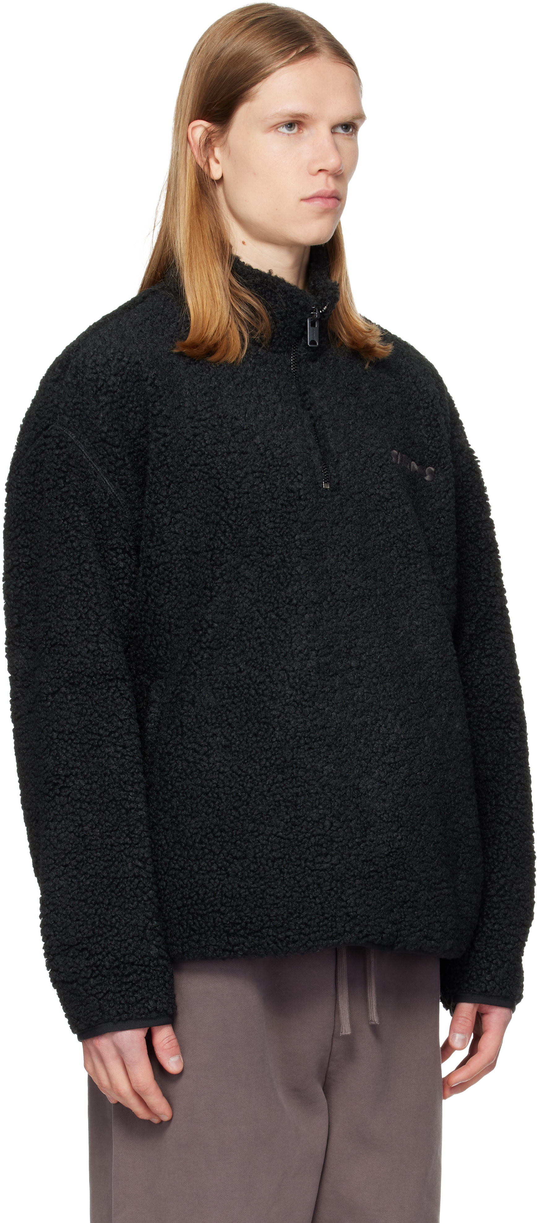SKIMS - Pull noir en sherpa à glissière un quart