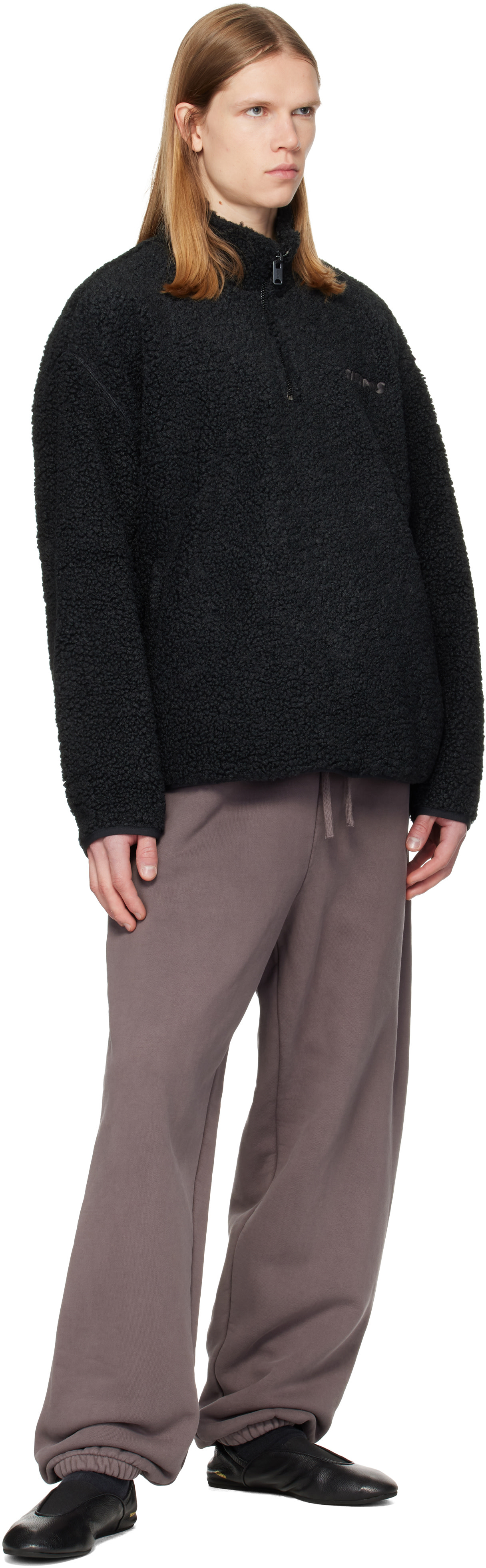 SKIMS - Pull noir en sherpa à glissière un quart