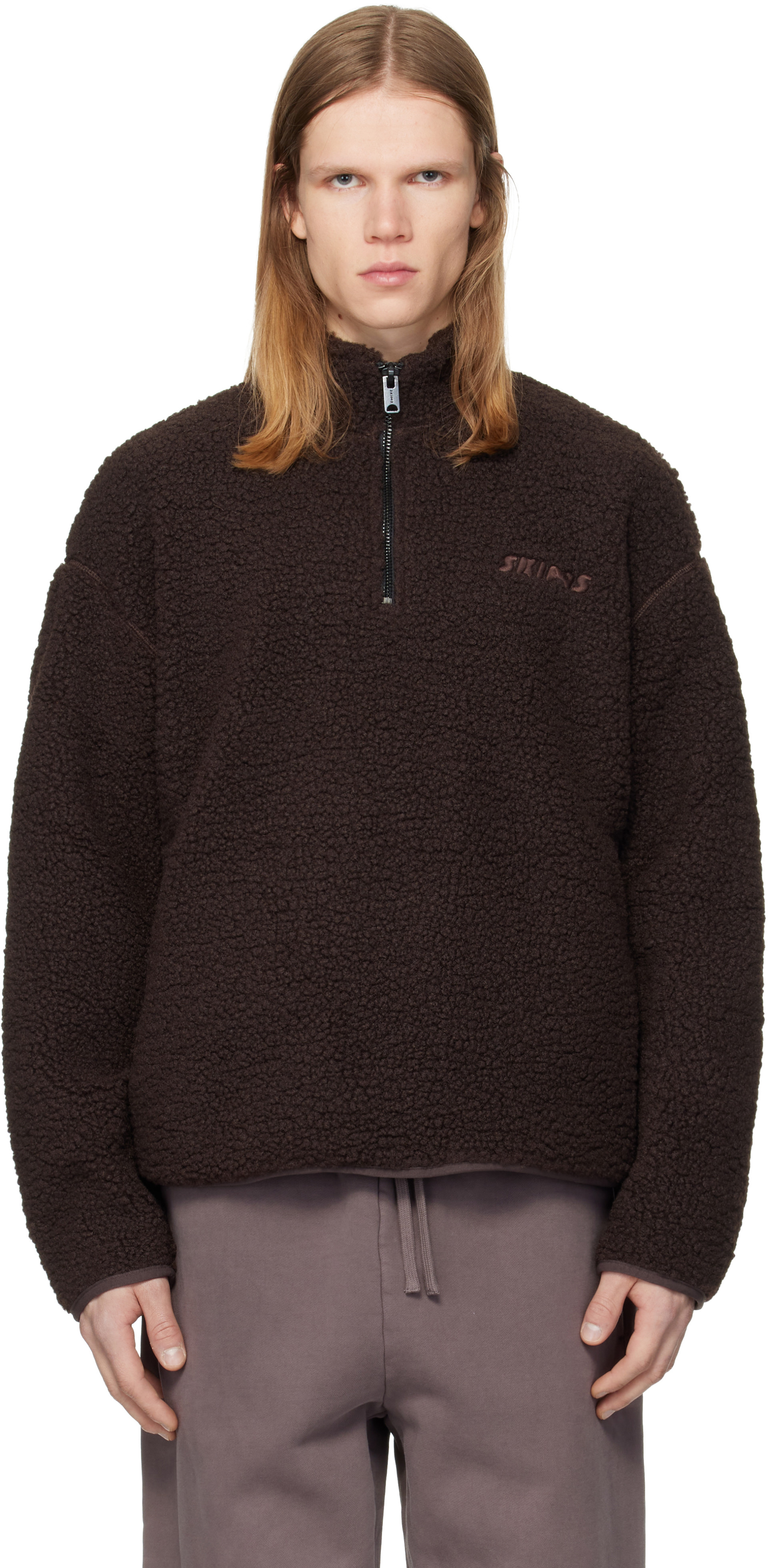 SKIMS - Pull brun en sherpa à glissière un quart