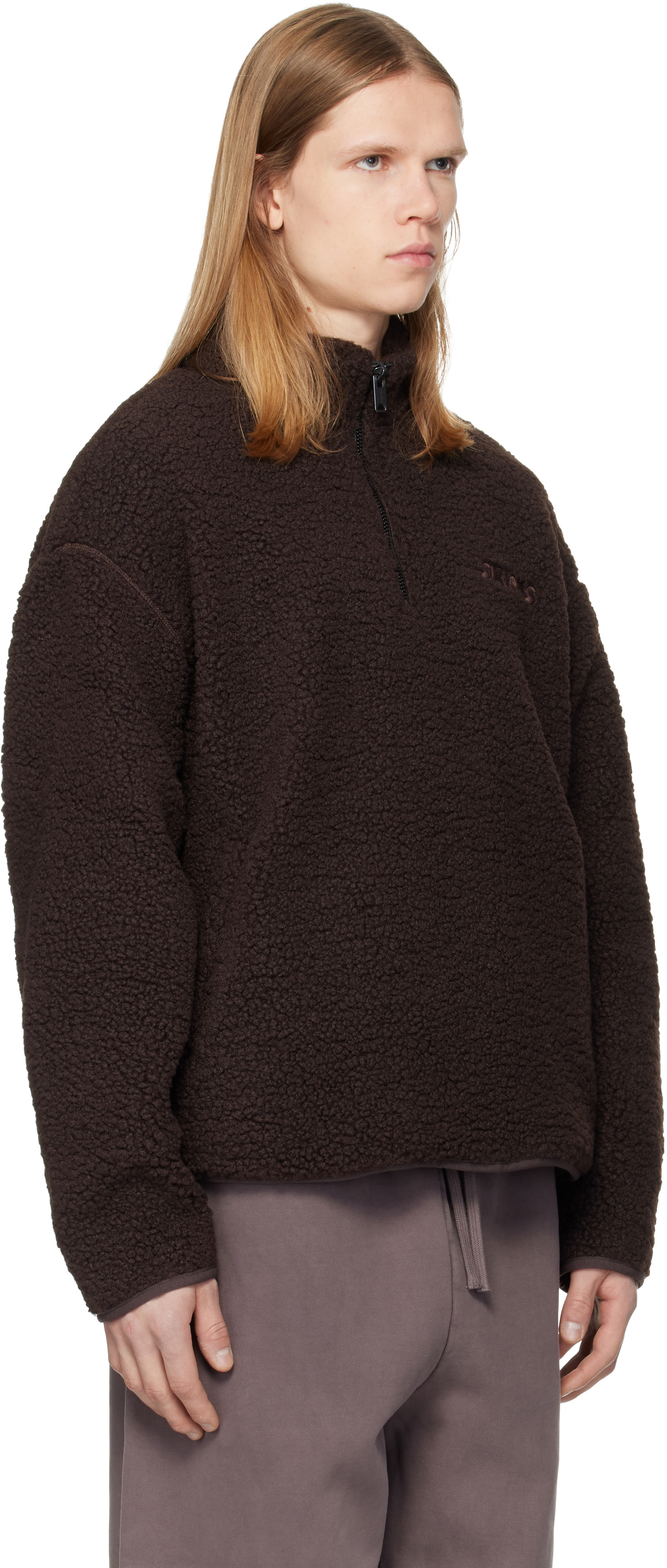 SKIMS - Pull brun en sherpa à glissière un quart