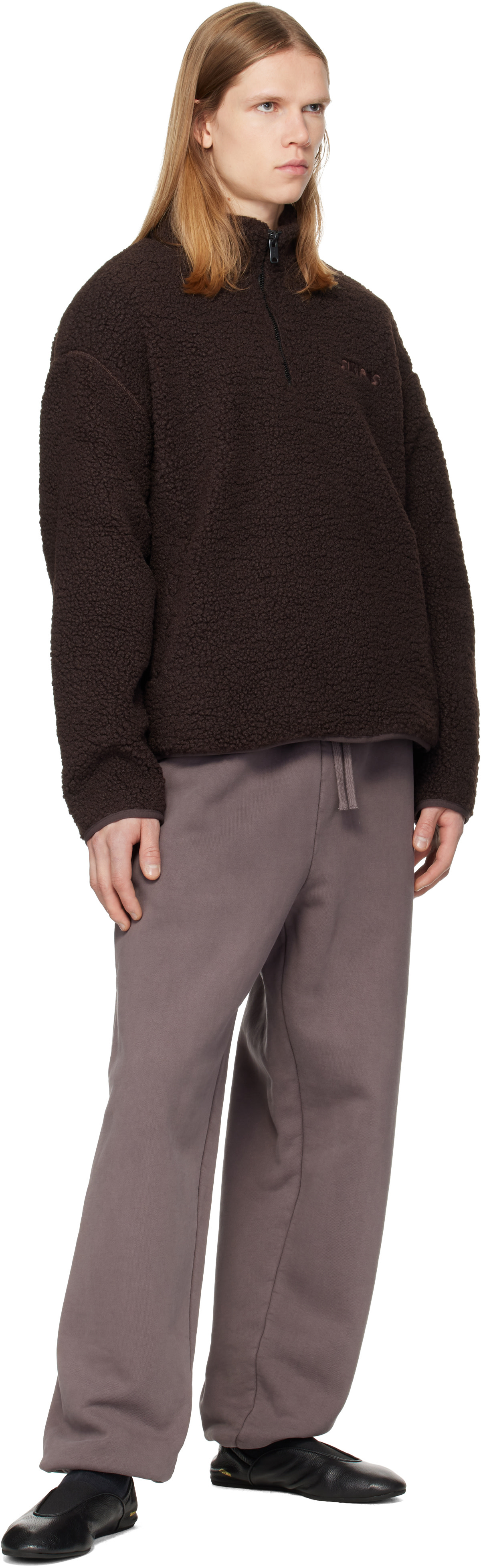 SKIMS - Pull brun en sherpa à glissière un quart