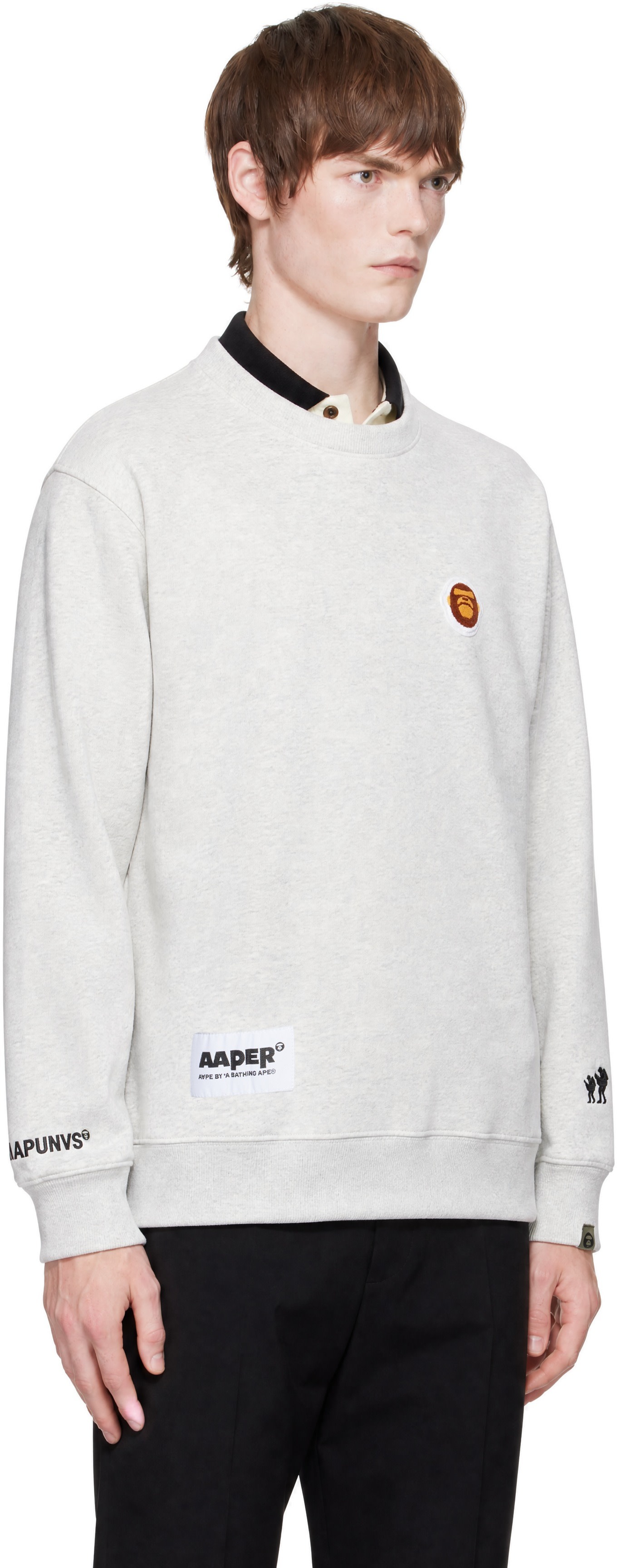 AAPE by A Bathing Ape - Pull molletonné 'AAPER' Aldo blanc cassé à logos
