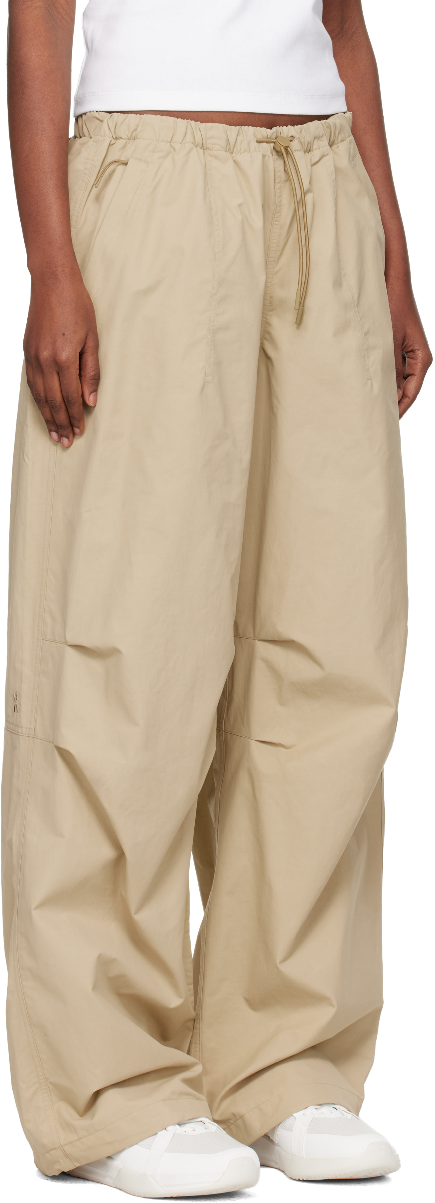 On: Beige Parachute Lounge Pants | SSENSE Canada
