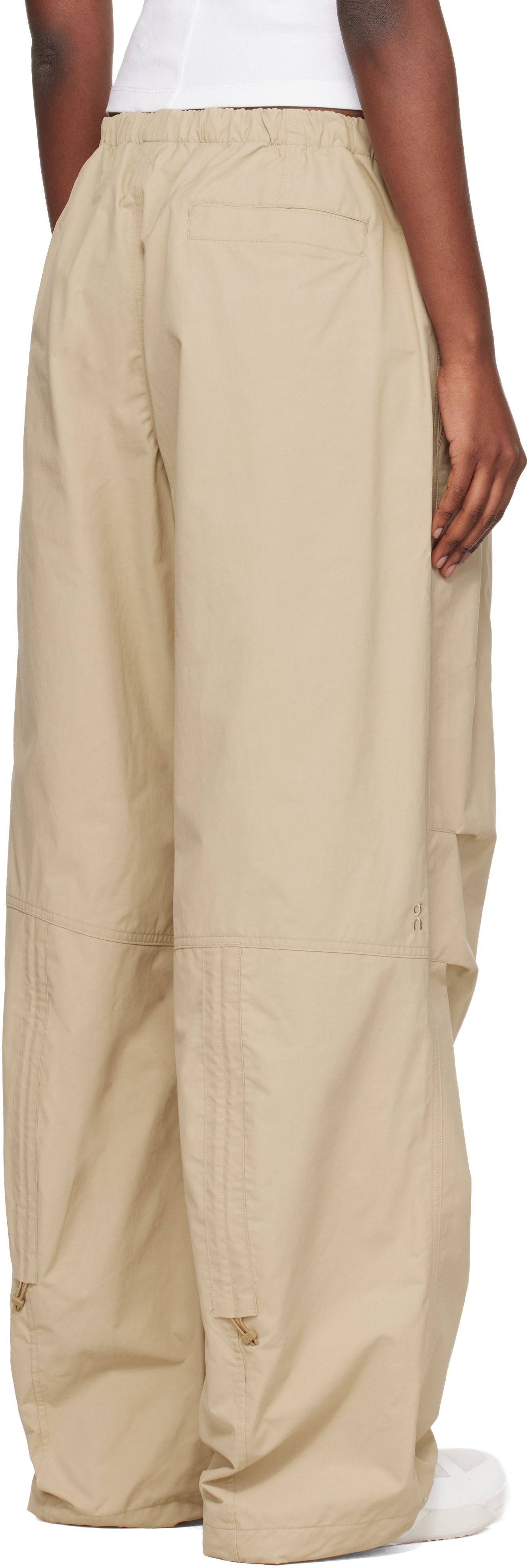 On: Beige Parachute Lounge Pants | SSENSE Canada