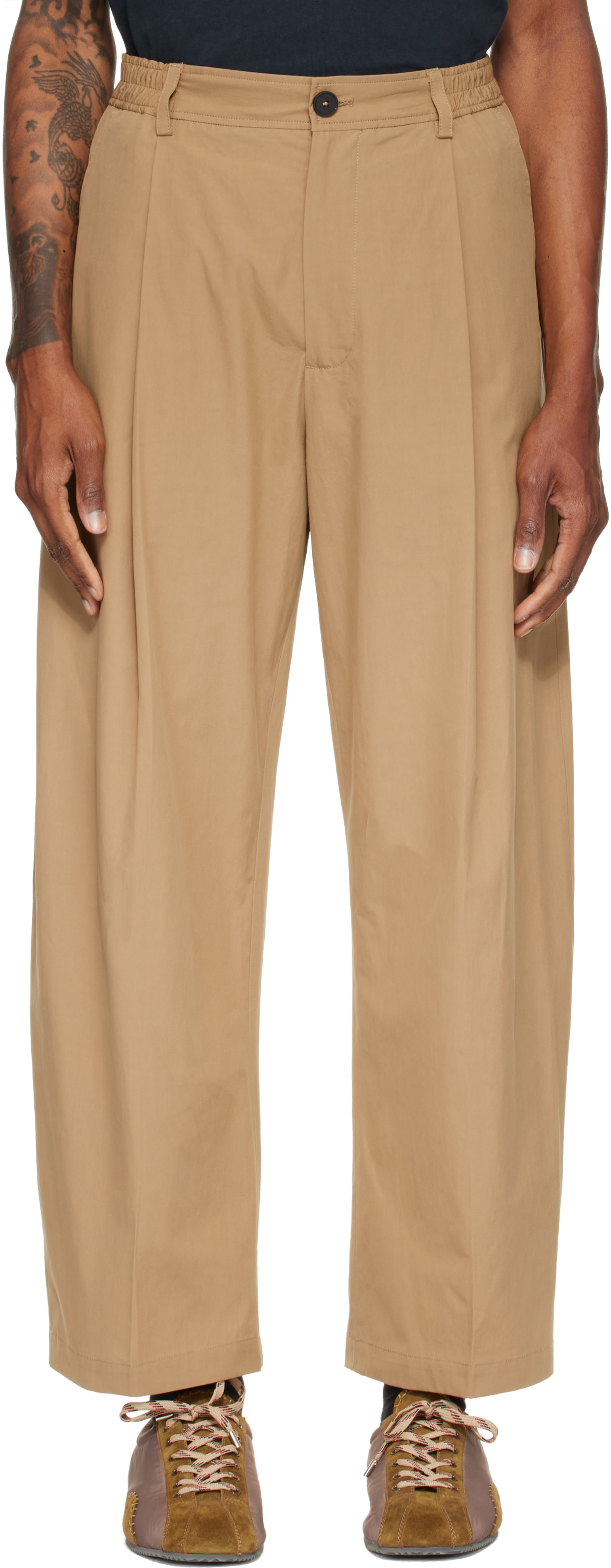 Studio Nicholson: Tan Shire Cotton Pleated Trousers | SSENSE