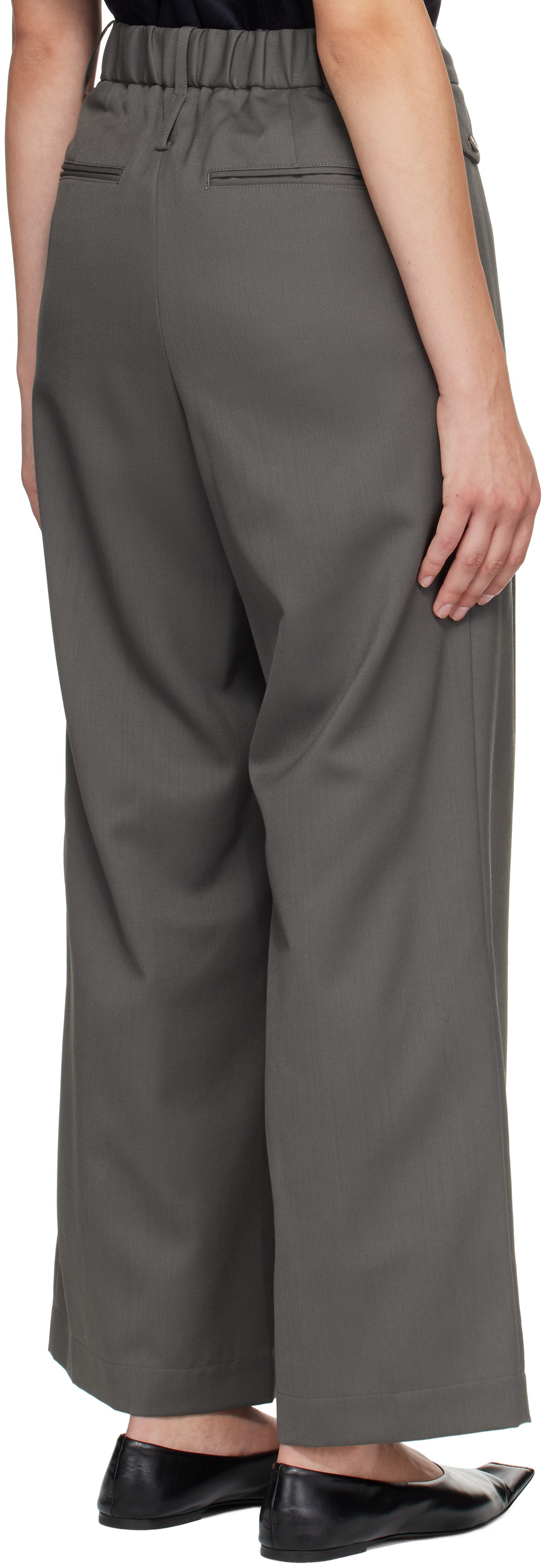 ISSEY MIYAKE: Gray Lustrous Wool Trousers | SSENSE