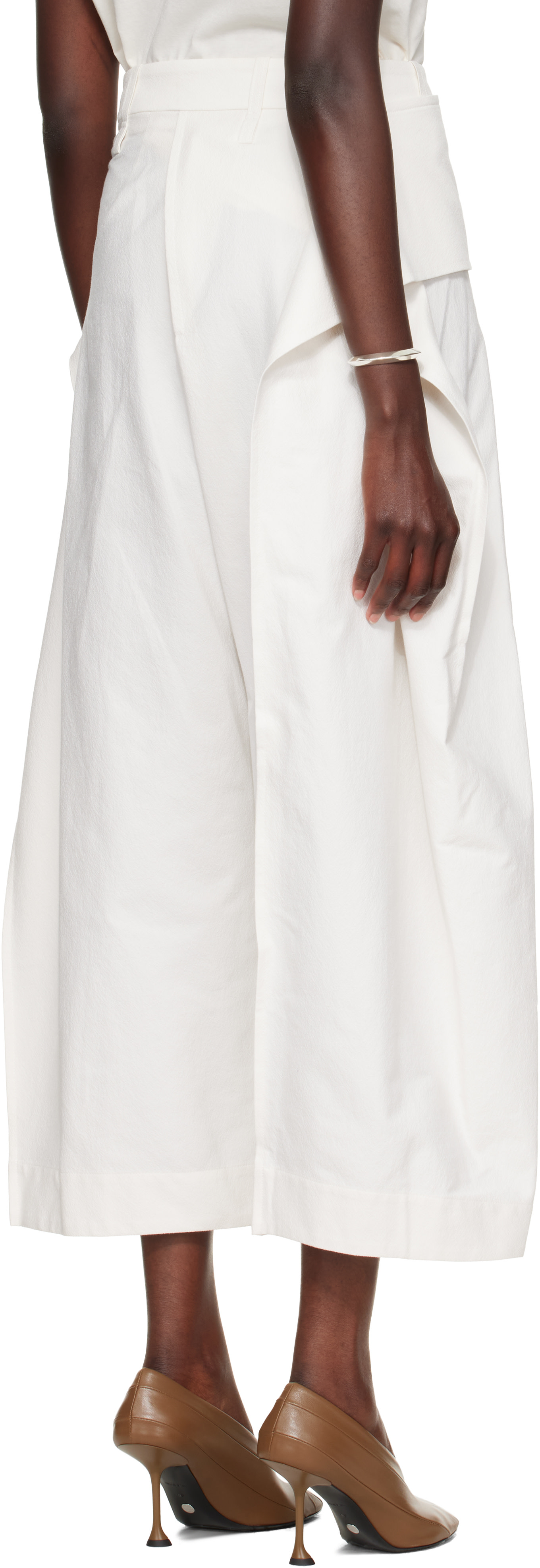 ISSEY MIYAKE: Off-White Grainy Trousers | SSENSE