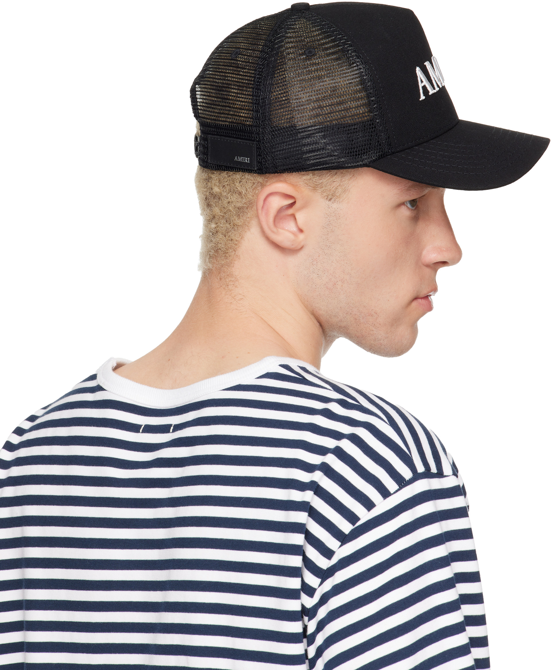 AMIRI: Black 'Amiri' Core Logo Trucker Cap | SSENSE