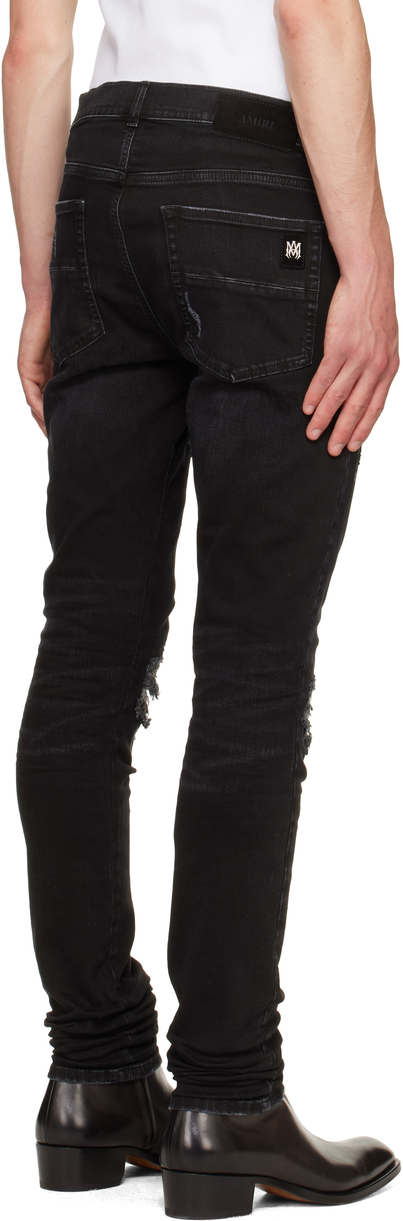 AMIRI: Black Studded MX1 Jeans | SSENSE