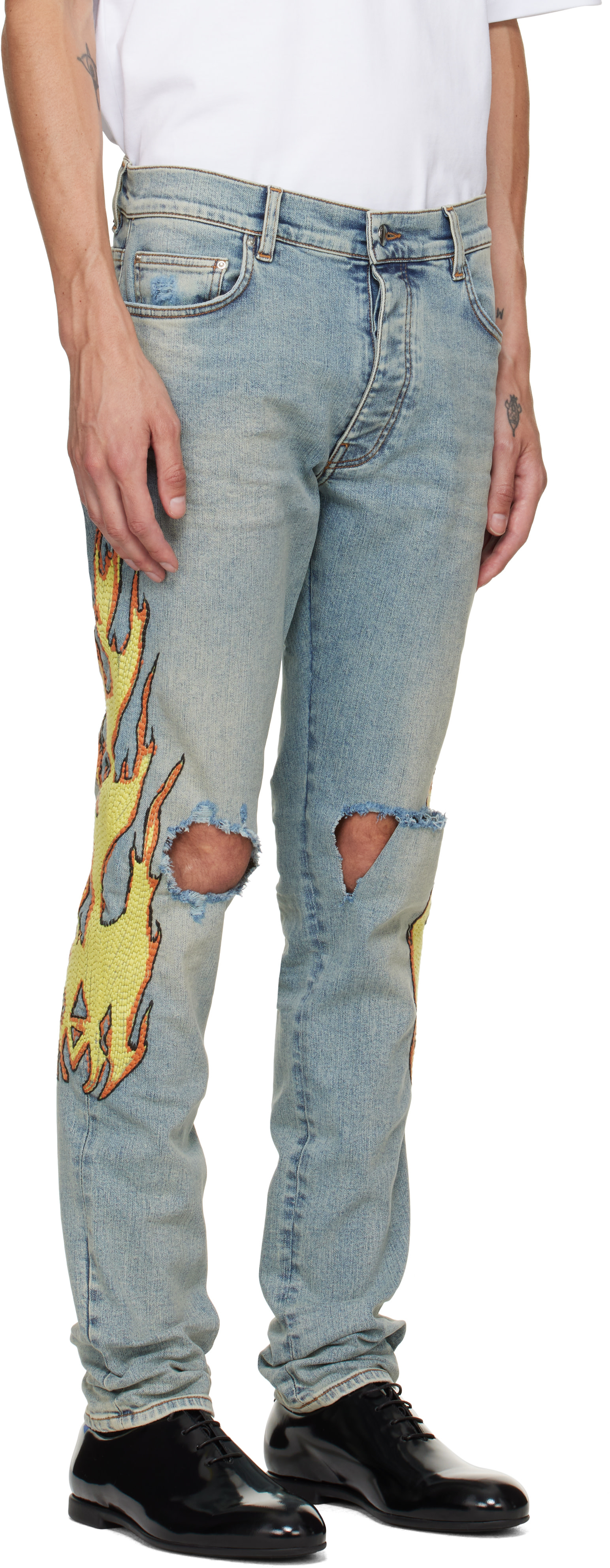 AMIRI: Blue Flames Emb Skinny Jeans | SSENSE
