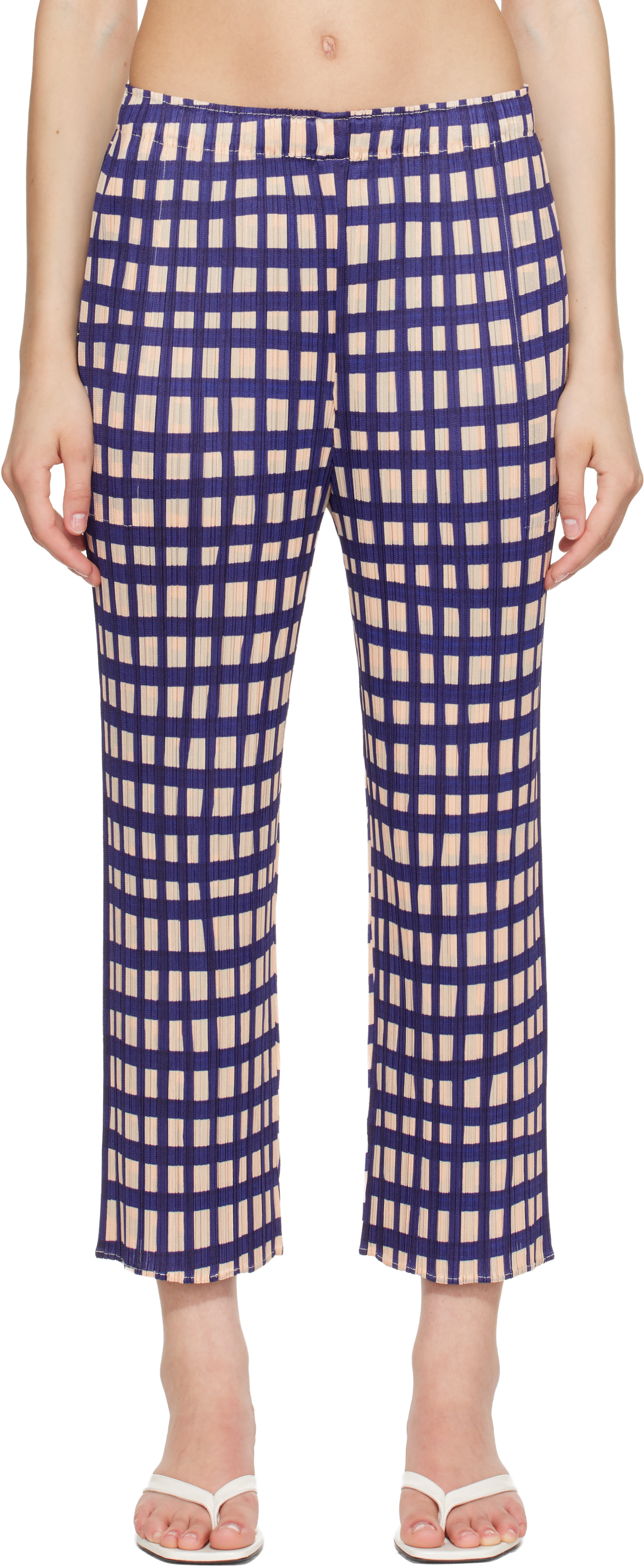 PLEATS PLEASE ISSEY MIYAKE: Navy Basket Trousers | SSENSE