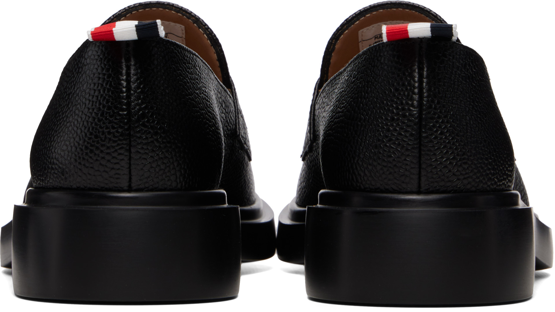 Thom Browne: Black Pebble Grain Rubber Sole Penny Loafers | SSENSE