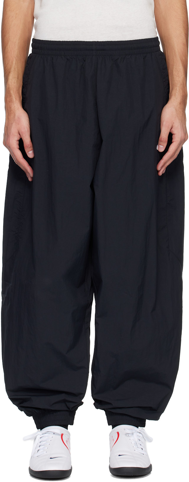 Nike: Black Nike Club Oversized Woven Track Pants | SSENSE Canada