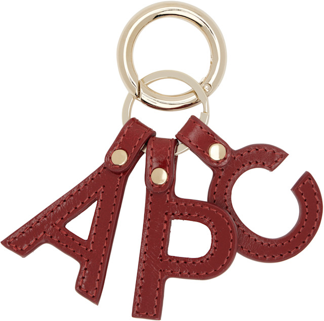 A.P.C.: ゴールド＆レッド Lettres 'A.P.C.' キーホルダー | SSENSE 日本