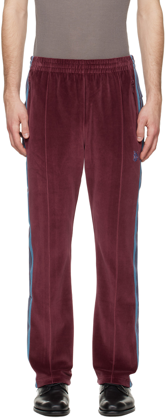 NEEDLES: Burgundy Narrow Track Pants | SSENSE