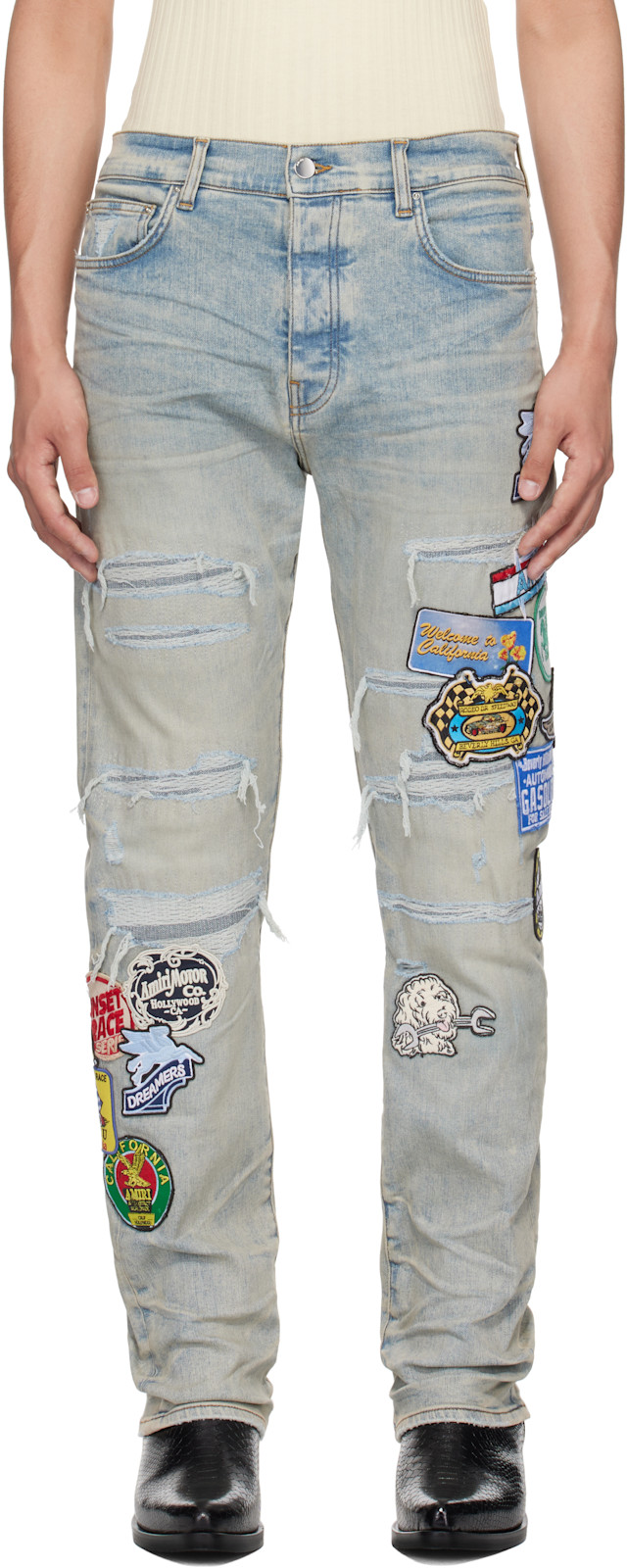 AMIRI: Blue Station Patch Repair Slim Jeans | SSENSE