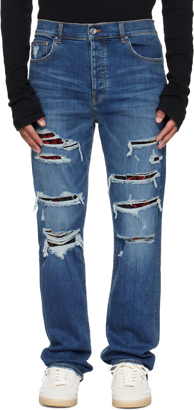 AMIRI: Blue Floral Velvet Slim Thrasher Jeans | SSENSE