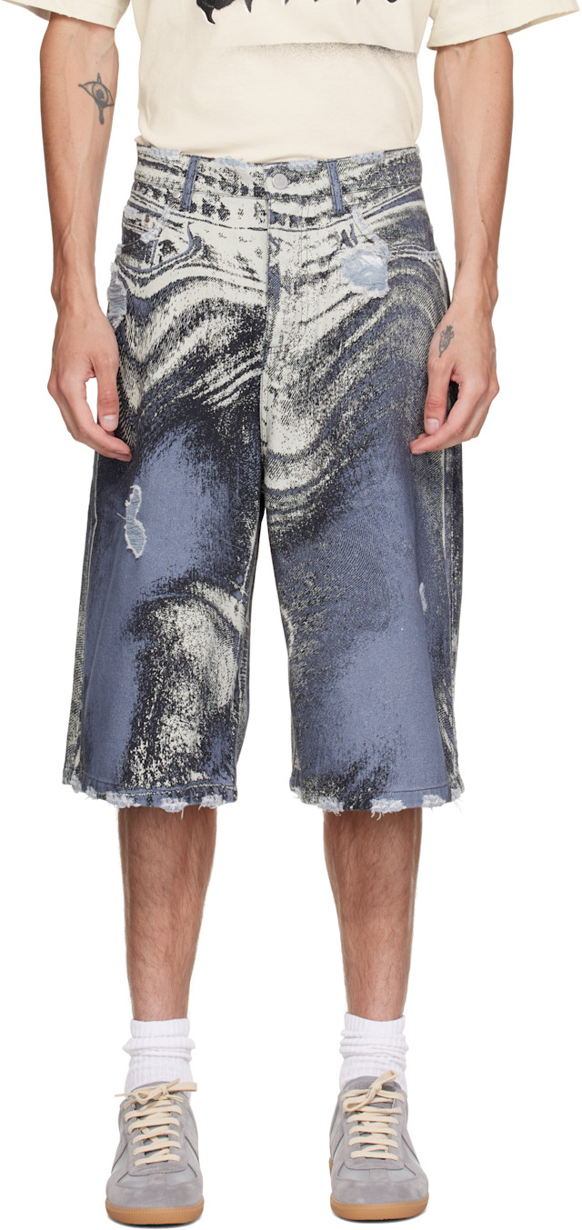 CAMPERLAB: Blue Distorted Print Distressed Denim Shorts | SSENSE