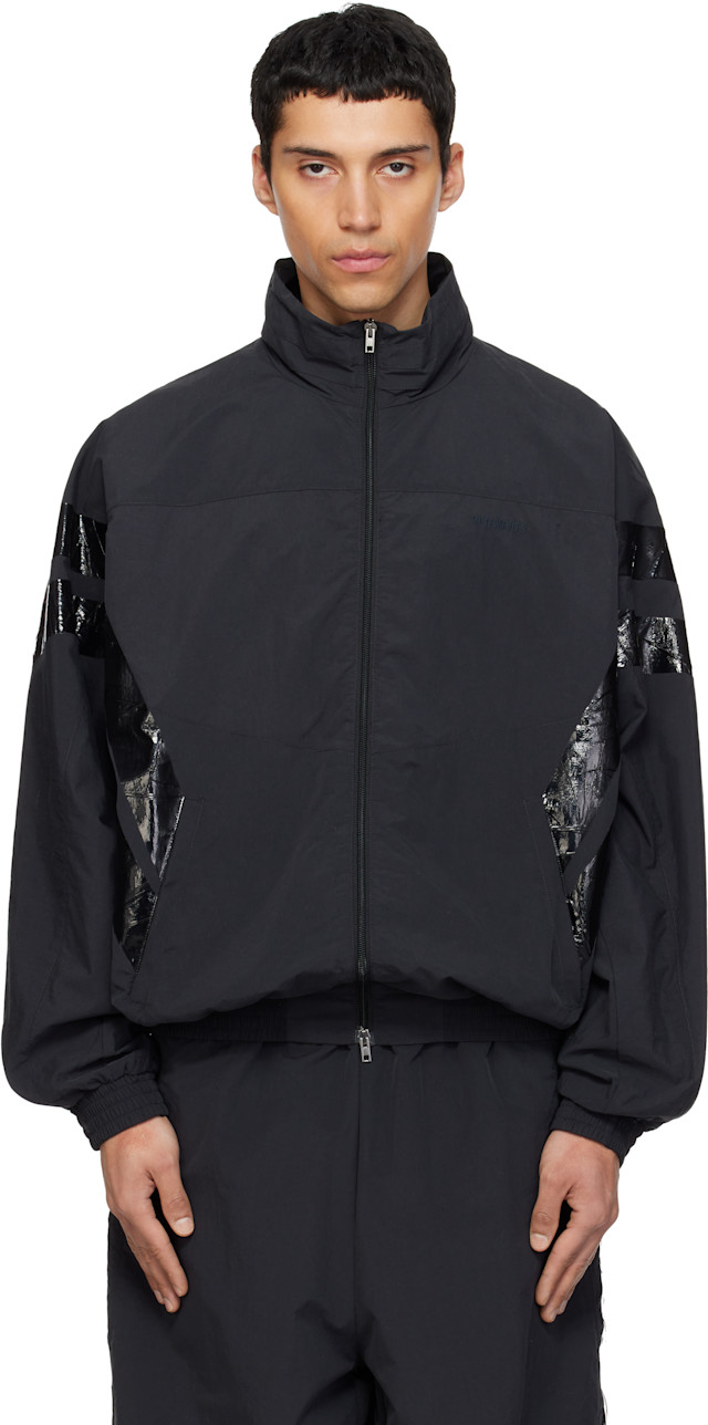 VETEMENTS: Black Taped Track Jacket | SSENSE