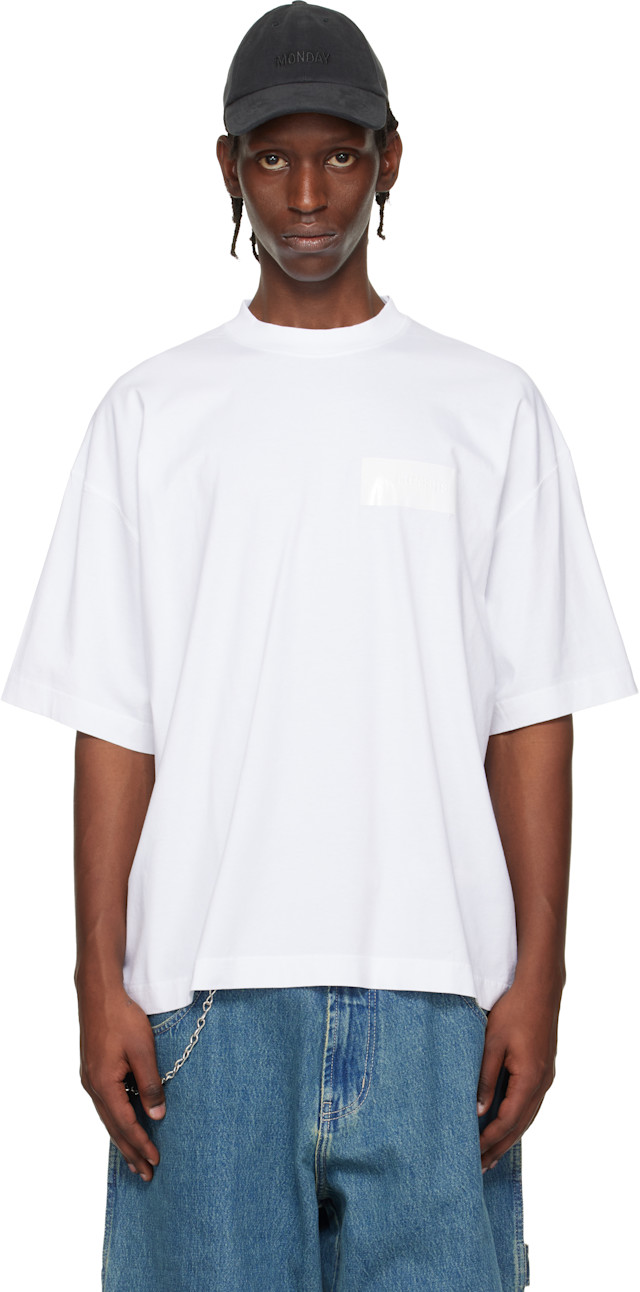 VETEMENTS: White Taped Logo T-shirt | SSENSE