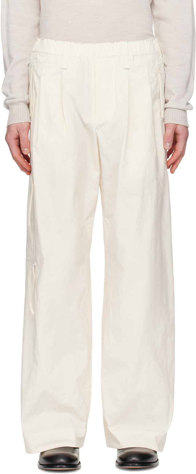 HOMME PLISSÉ ISSEY MIYAKE: Off-White Quarry Trousers | SSENSE