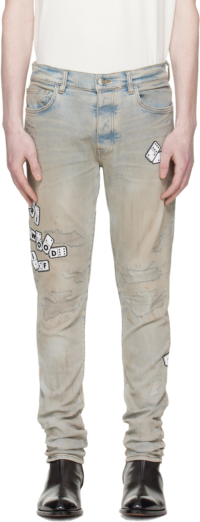 AMIRI: Blue Domino Appliqué Skinny Jeans | SSENSE